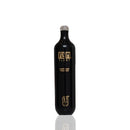 A black glass vape with gold lettering by Flum UT