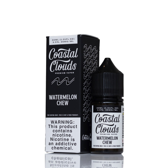 A bottle of Coastal Clouds Watermelon Chew e-liquid next to its black and white packaging box, displayed on a reflective white surface.