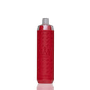 A red cylindrical bottle with a textured pattern and a silver cap, standing upright on a white background with a faint reflection below.