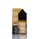 A 30ml bottle of Kilo Vanilla Custard Tobacco e-liquid with its matching cardboard packaging box, displayed on a reflective white surface against a white background.