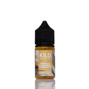 A 10ml bottle of Kilo Vanilla Custard Tobacco e-liquid, featuring amber-colored liquid inside a clear bottle with a black childproof cap and a beige label, set against a plain white background with a soft reflection.