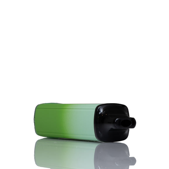 A green gradient vape pen with a black mouthpiece, shown horizontally on a reflective white surface against a white background.