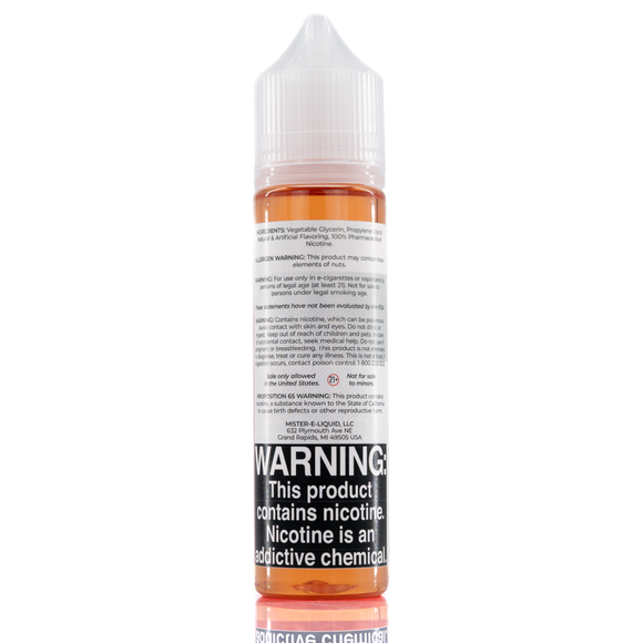A mister e-liquid bottle is placed on a reflective surface and against a white background. The bottle outlines the ingredients and the warning label. 