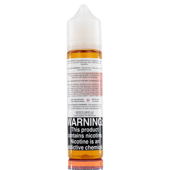 A mister e-liquid bottle is placed on a reflective surface and against a white background. The bottle outlines the ingredients and the warning label. 