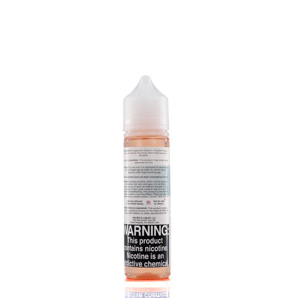 A mister e-liquid bottle is placed on a reflective surface and against a white background. The bottle outlines the ingredients and the warning label. 
