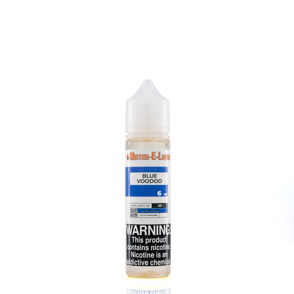 A 6mg mister e-liquid bottle of 'blue voodoo' is placed on a reflective surface and against a white background. The label is blue, grey, and white.