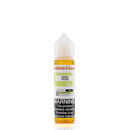 A 12mg mister e-liquid bottle of 'jade tiger' is placed on a reflective surface and against a white background. The label is green, grey, and white.