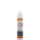 A mister e-liquid bottle is placed on a reflective surface and against a white background. The bottle outlines the ingredients and the warning label. 