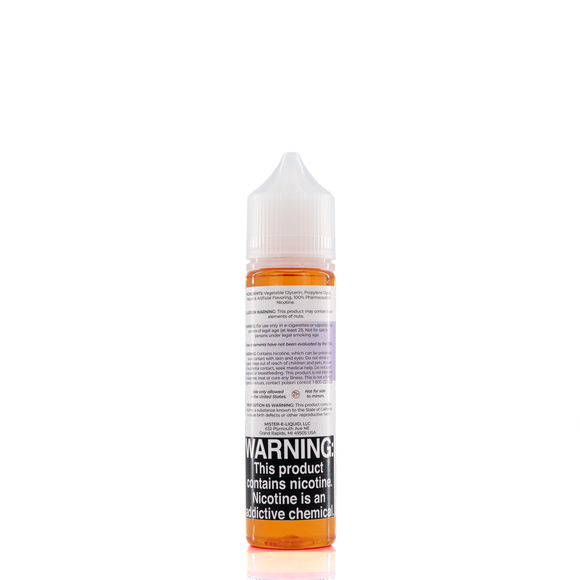 A mister e-liquid bottle is placed on a reflective surface and against a white background. The bottle outlines the ingredients and the warning label. 