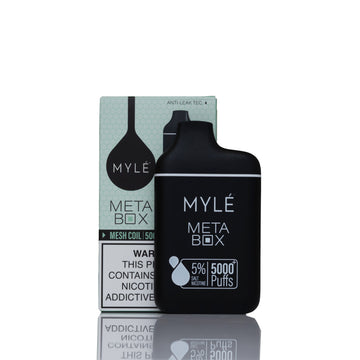Mylé Meta Box disposable vape device in matte black standing in front of its light green and white packaging box on a reflective white surface.