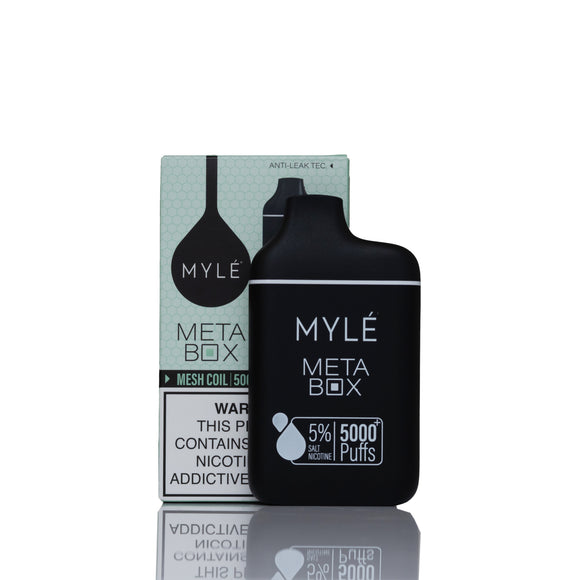 Mylé Meta Box disposable vape device in matte black standing in front of its light green and white packaging box on a reflective white surface.