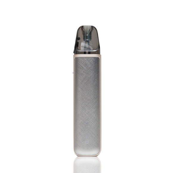 A slim, rectangular metallic silver vape device with a textured grip and a clear mouthpiece, shown vertically on a white background with a subtle reflection.