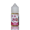 A bottle of Monster Vape Labs 'The Milk' Strawberry e-liquid, featuring a white plastic cap and a white label with red and pink graphics, set against a plain white background with a reflection below.